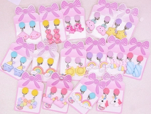 Set of 15 pairs of colorful cartoon clip-on earrings with rainbow and unicorn designs