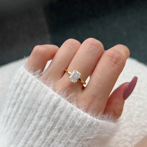 Luxurious S925 sterling silver ring with large rectangular cut clear stone on finger