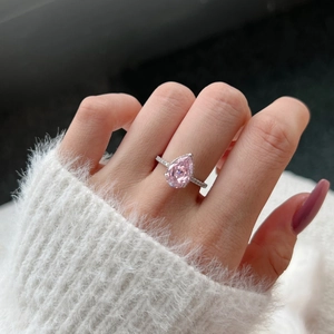 Elegant S925 sterling silver ring with pear cut pink carbon diamond on finger