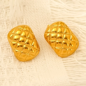 Golden titanium steel stud earrings with geometric quilted pattern and polished finish