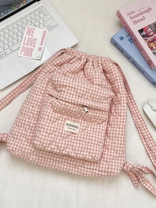 Pink and white checkered quilted backpack with heart pattern and drawstring closure