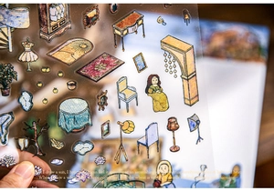Close-up of vintage PET stickers featuring classical art and furniture for DIY projects