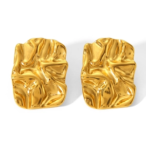 Irregular 18K gold titanium steel earrings with textured lava fold design on white background