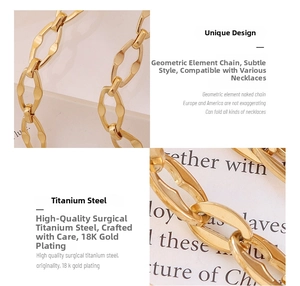 Macro detail of geometric 18K gold plated titanium steel chain with high polished finish