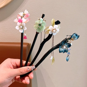 Handcrafted sandalwood hair sticks set with jade flowers and tassels for Hanfu outfits