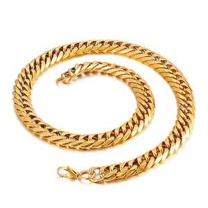 Polished gold stainless steel Cuban link necklace with lobster clasp on white background