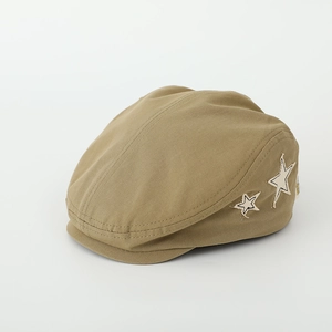 Detail of khaki cotton beret with white star embroidery and raw edge texture