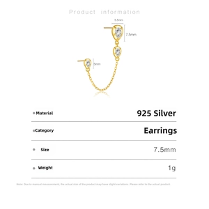 Macro detail of gold S925 sterling silver chain earrings with pear-shaped zircon stones