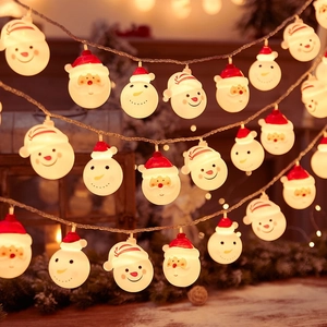 LED Christmas lights featuring Santa and Snowman shapes with soft warm white glow