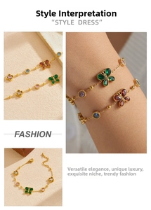 Dettaglio del bracciale placcato oro con ciondoli a farfalla colorati e pietre preziose