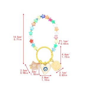 Detail view of Evil Eye charm keychain with dimensions in centimeters and inches