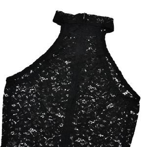 Close-up of black lace high-neck halter top with seamless back zipper detail