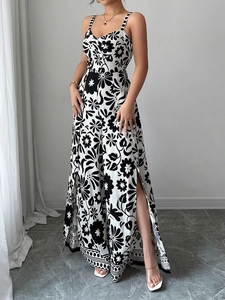 Detail of floral print jumpsuit featuring elegant knot front and high side slit design