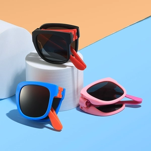 Foldable children's UV protection sunglasses in black, blue, and pink colors