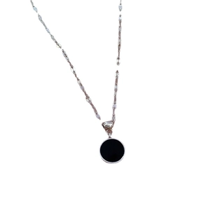 Polished silver titanium steel necklace with a minimalist round black shell pendant