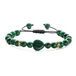 Adjustable green malachite beaded bracelet featuring a heart stone and gold spacers