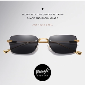 Close-up of rimless square sunglasses with gold metal temples and detailed grid texture