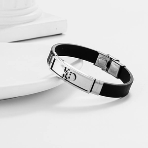 Men's hollow stainless steel and black silicone bracelet with silver skull charm