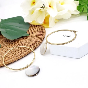 50mm minimalist gold hoop earrings with round white mother of pearl shell pendants