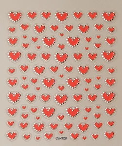 Detailed close-up of 3D gold embossed heart nail stickers with silver dotted outlines