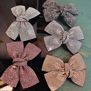 Sparkling rhinestone oversized bow hair clips in multiple colors for elegant hairstyles
