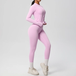 Veste de sport rose ajustée avec passe-pouces et ensemble legging de compression taille haute