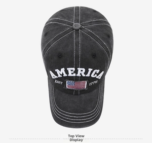 Close-up of vintage washed baseball cap with America embroidery and flag patch