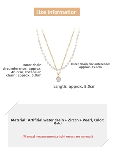 Close-up of double layer gold necklace featuring pearls and heart pendant with dimensions