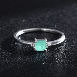 Elegant 925 sterling silver ring featuring a square green tourmaline and side stones