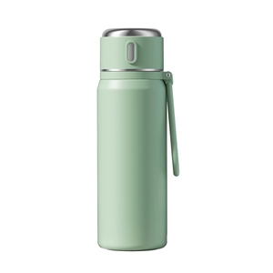 Smart stainless steel vacuum flask in mint green with portable strap and lid cup
