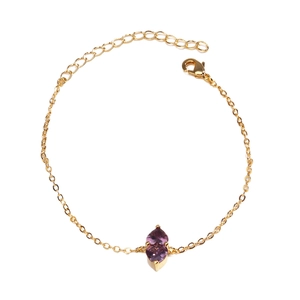 Elegant gold chain bracelet with two heart-shaped purple crystals and lobster clasp