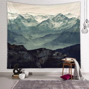 Detail of artistic mountain landscape tapestry with gradient shades on a white brick wall