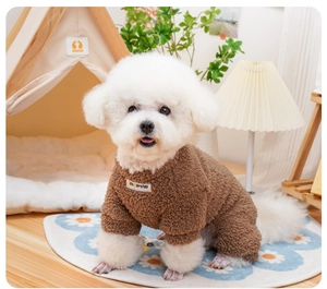 Close-up of brown fleece pet jumpsuit with white faux fur trim and branded patch