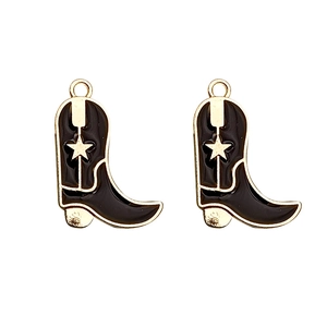 Pair of black enamel western cowboy boot charms with gold star details for jewelry making