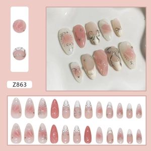 Pink and creamy white gradient almond press-on nails with 3D silver bow and star accents
