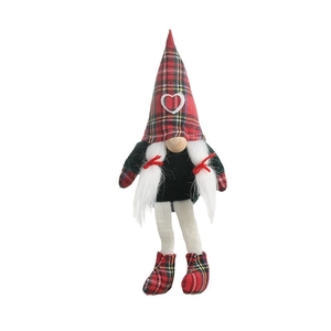 Classic red and green fabric Christmas gnome plush doll with braids on white background