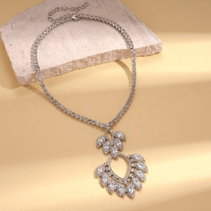 Elegant silver-tone water drop pendant necklace with pavé zircons on natural stone