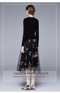 Dettaglio del ricamo a farfalla su gonna in tulle e abito in maglia nera