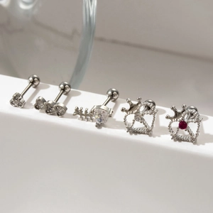 Surgical steel stud earrings set featuring silver heart fishbone and crown designs with zircon