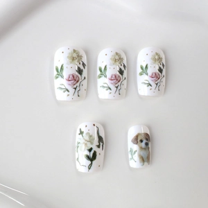 Floral and puppy print press-on nails set with creamy white base and hand-drawn roses