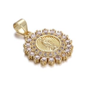Detailed close-up of golden virgin mary pendant with sparkling crystal halo setting