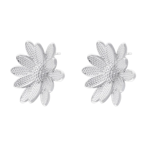 Detailed macro view of silver daisy stud earrings with textured layered petals