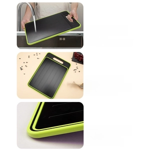 Black aluminum thawing cutting board with green silicone edge and anti-overflow design