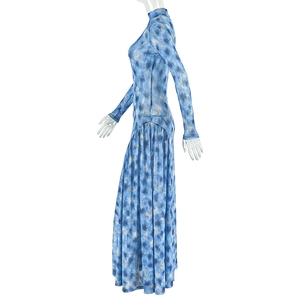 Close-up of blue print maxi dress with high neck and long sleeves on a side-view mannequin