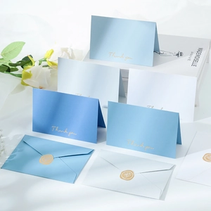 Detail of elegant gold foil Thank You cards and envelopes with wax seal motifs