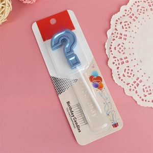 Blue question mark shaped birthday candle in retail blister packaging for party cake decor