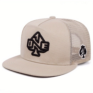 Macro detail of khaki baseball cap featuring black spade embroidery and mesh back