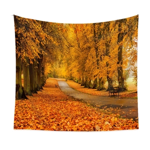Detail of autumn forest path tapestry featuring vibrant golden leaves and misty woods