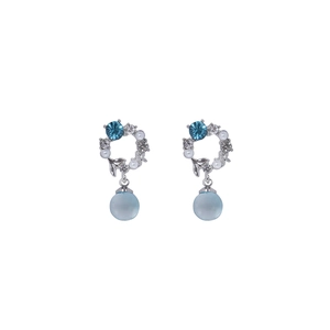 Silver geometric round earrings with light blue crystals and white pearls on white background