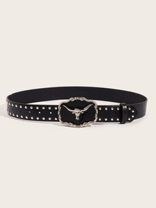 Close-up of black leather punk belt featuring silver studs and a bull head metal buckle
